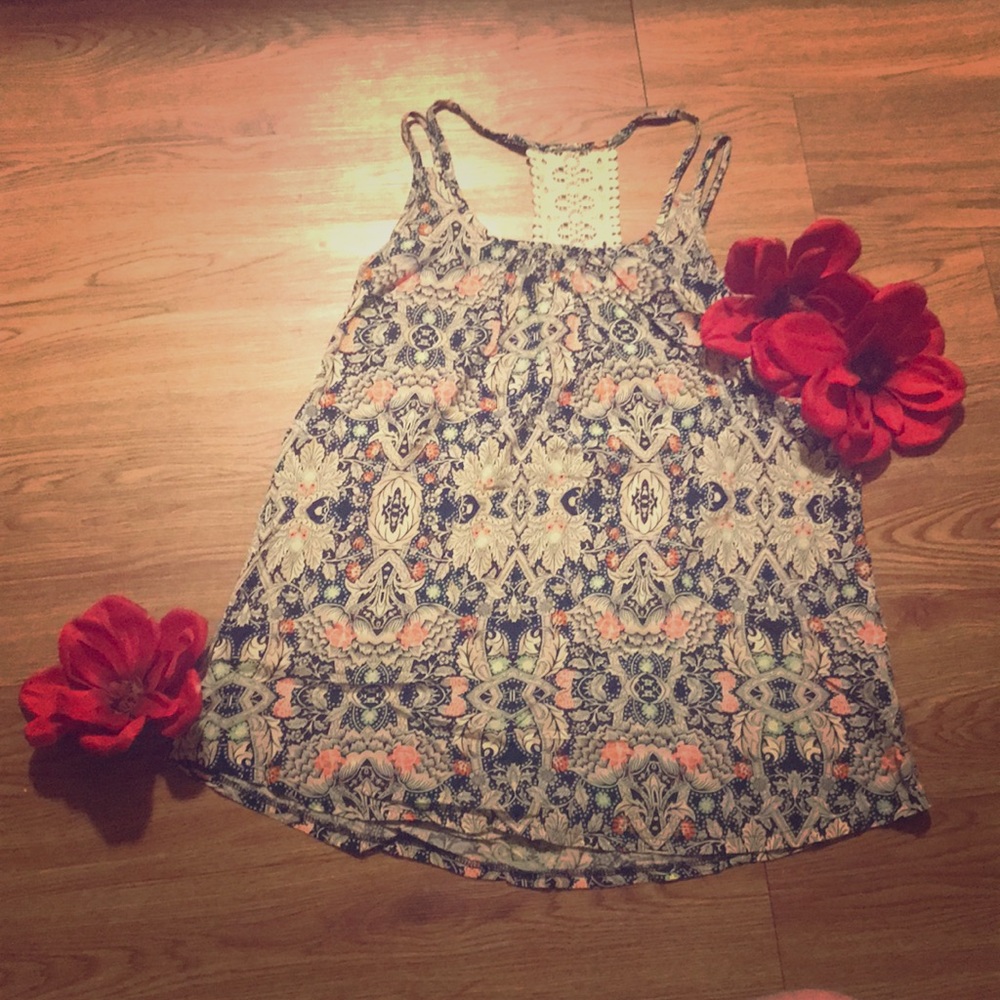 Double strapped floral top.